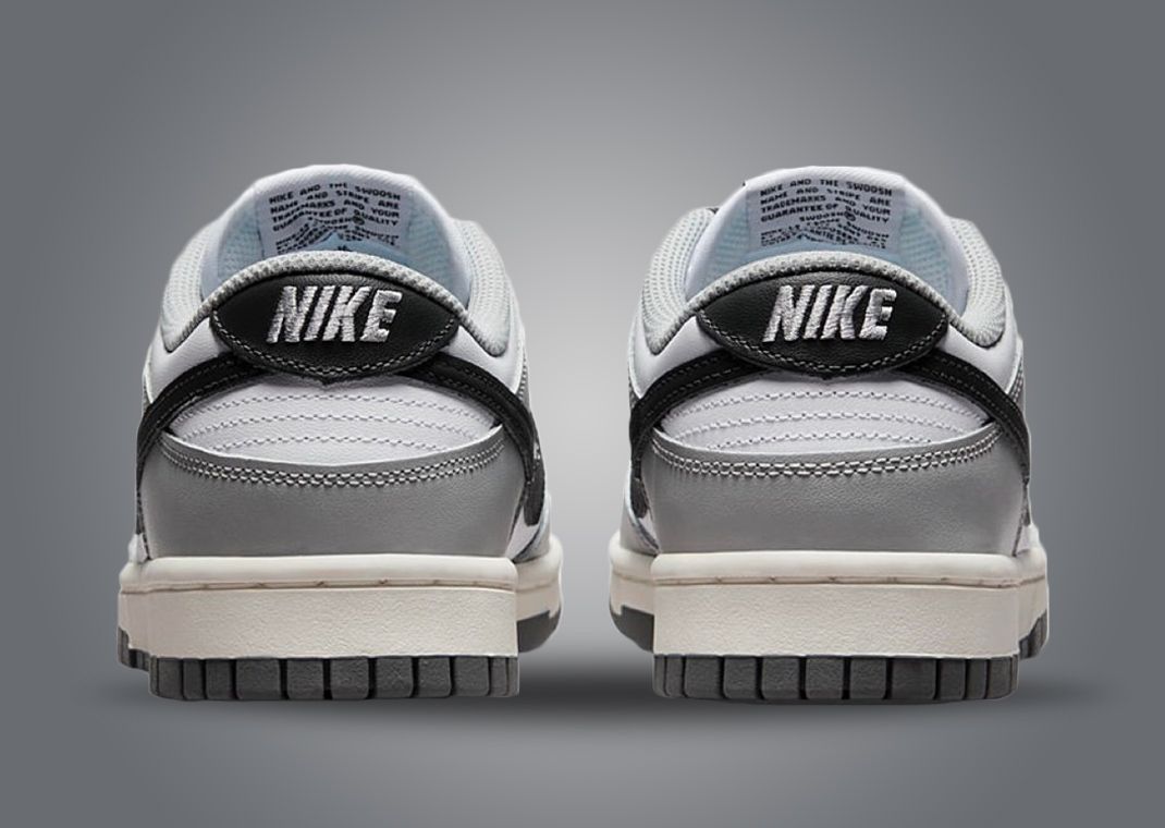 This Nike Dunk Low Comes In White And Light Smoke Grey