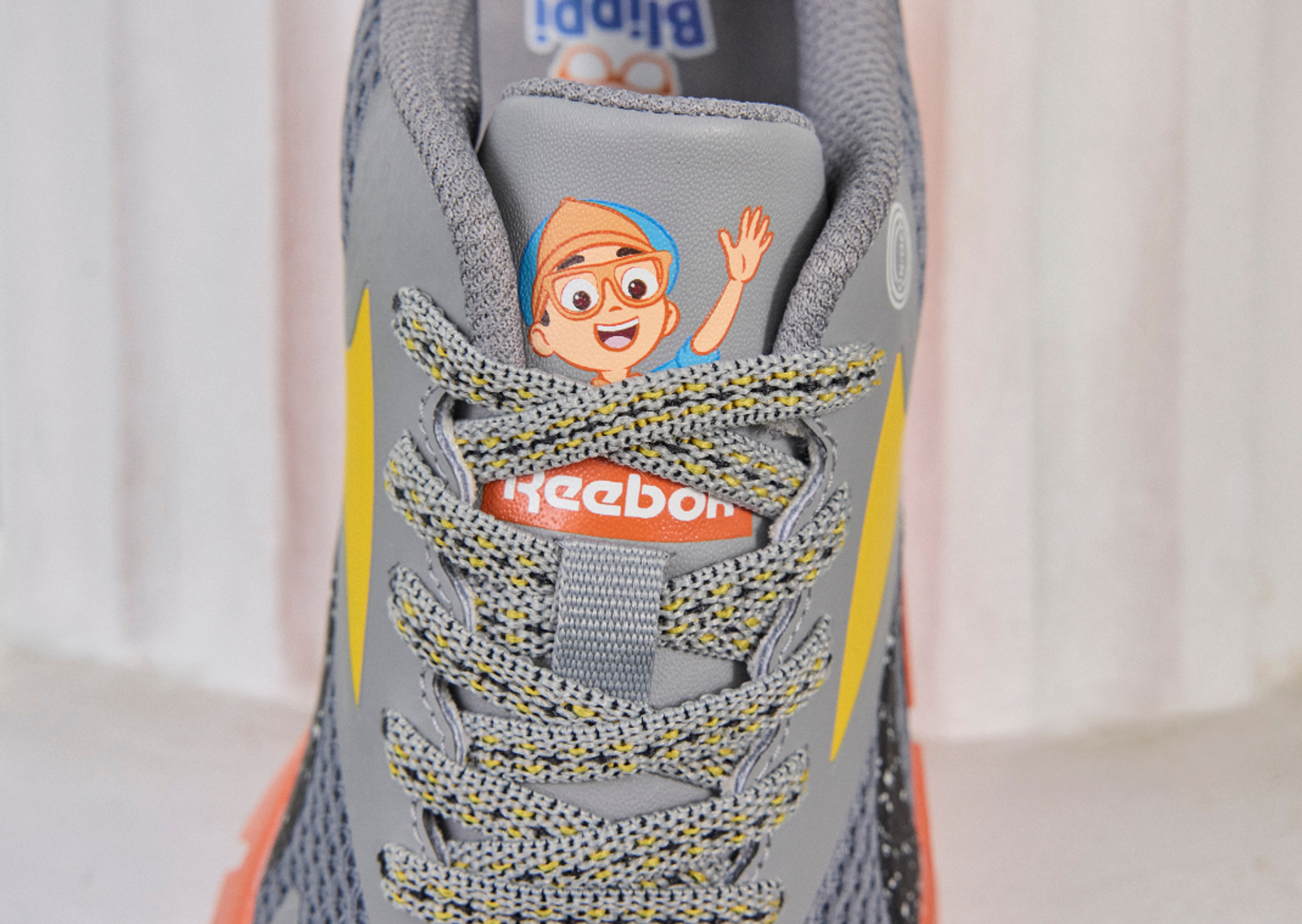 Blippi x Reebok Zig N’ Glow (PS) Tongue