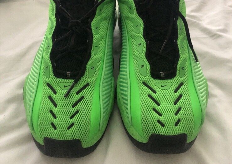 The Nike NOCTA Glide Slime Green is an EYBL Exclusive