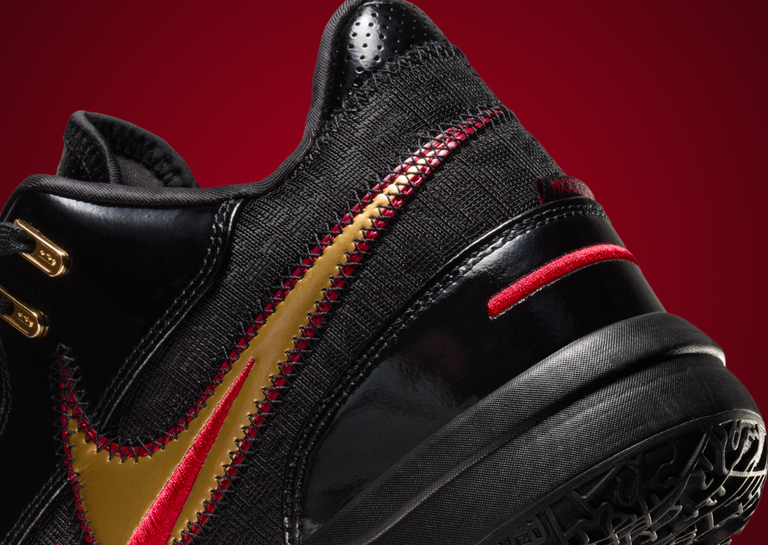 Nike LeBron NXXT Gen Ampd Black Metallic Gold University Red Heel Detail
