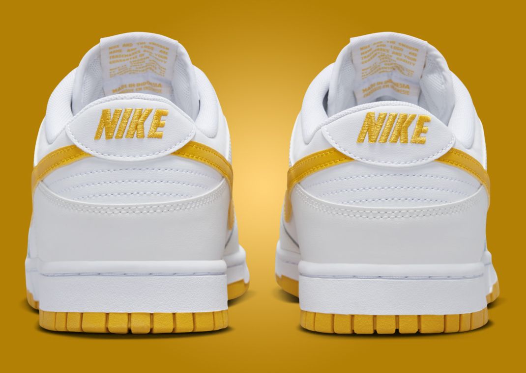 The Nike Dunk Low White University Gold Releases Summer 2024   F084476d03ea5ff1b36a96a586bc63771ff756d7 1070x760 