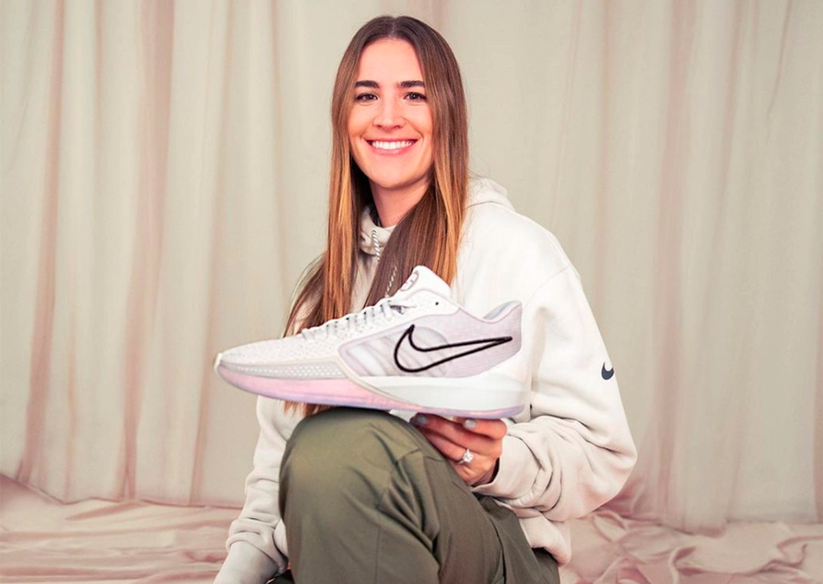 Sabrina Ionescu with her new Nike shoe, the Nike Sabrina 1