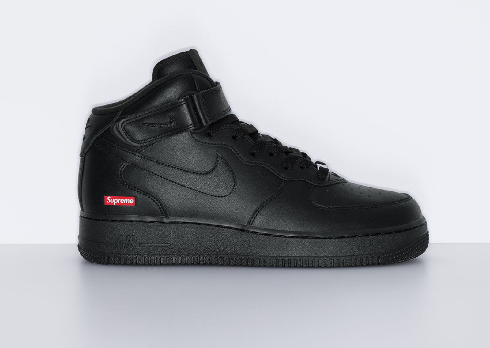 Supreme x Nike Air Force 1 Mid SP Black Lateral