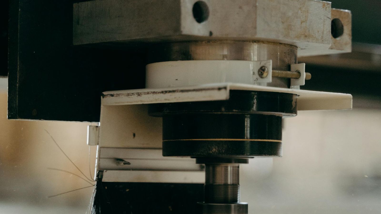 CNC machine cutting and shaping a wood-based panel
