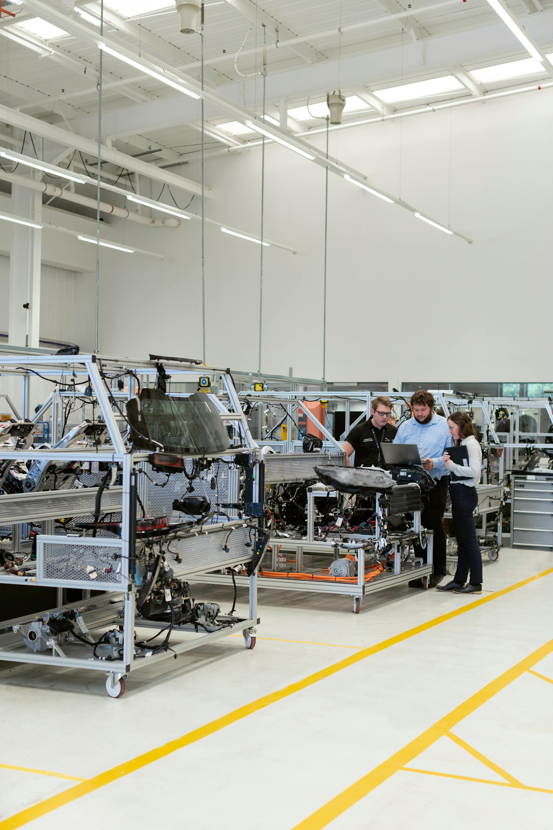 Engineers reviewing tool prototypes during a quality session