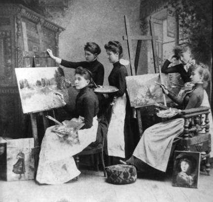 An art class taught by Adelia Armstrong Lutz, with students gathered around easels