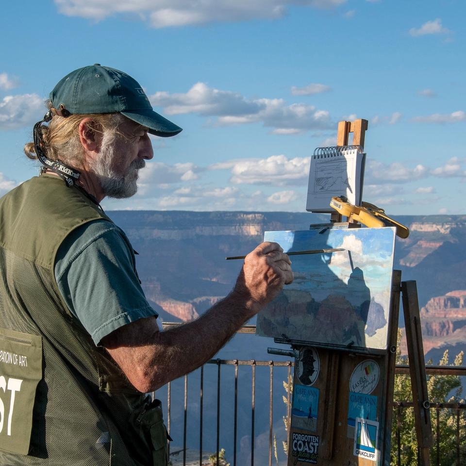 Plein air artist Kurt Larsen painting the Grand Canyon landscape from an outdoor easel