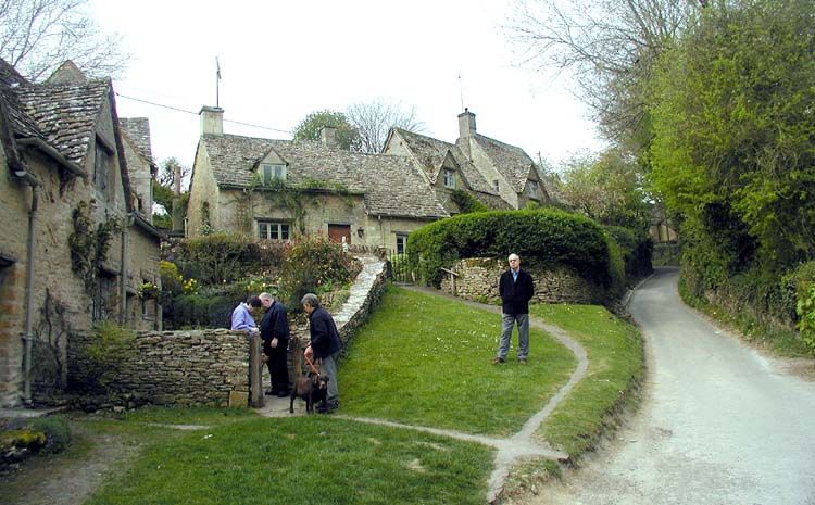 Traditional stone cottages beside the river in Bibury, Cotswolds