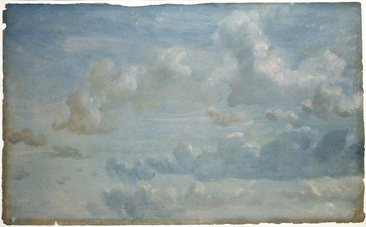Study of billowing clouds against a pale sky