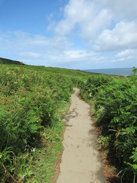 Coastal footpath running along rugged cliffs near Zennor and Carrick Du, St Ives