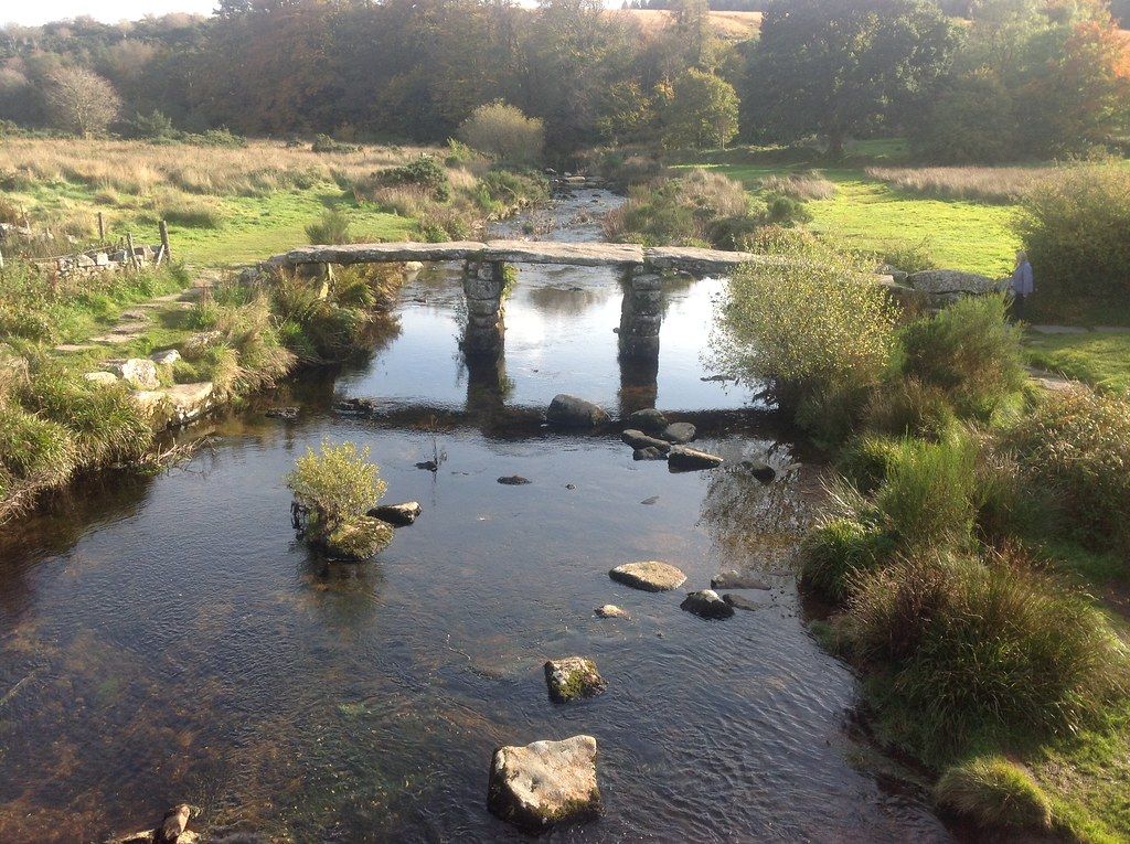 Stone clapper bridge spanning the East Dart River on Dartmoor.