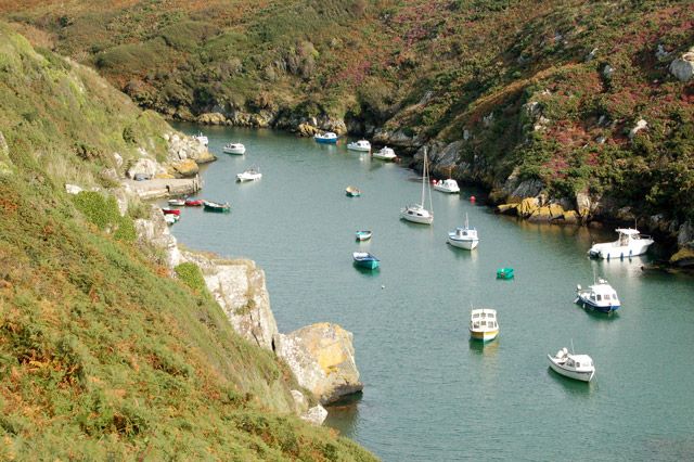 Boats moored in Porthclais harbour.