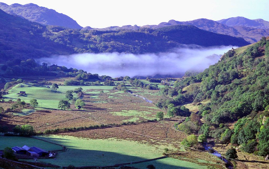 Mountain valley shrouded in mist.