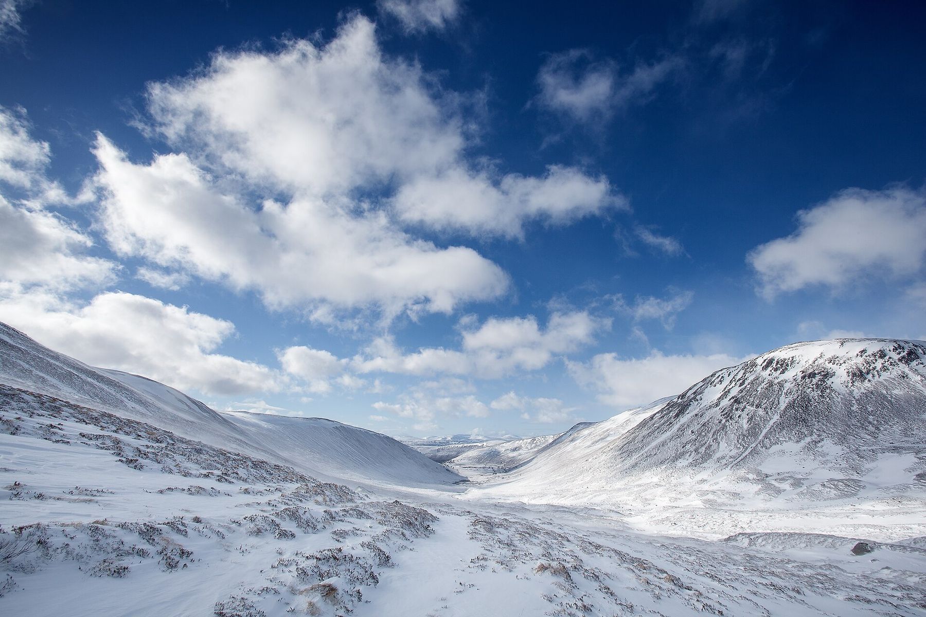 Snow-filled mountain valley in Cairngorms National Park