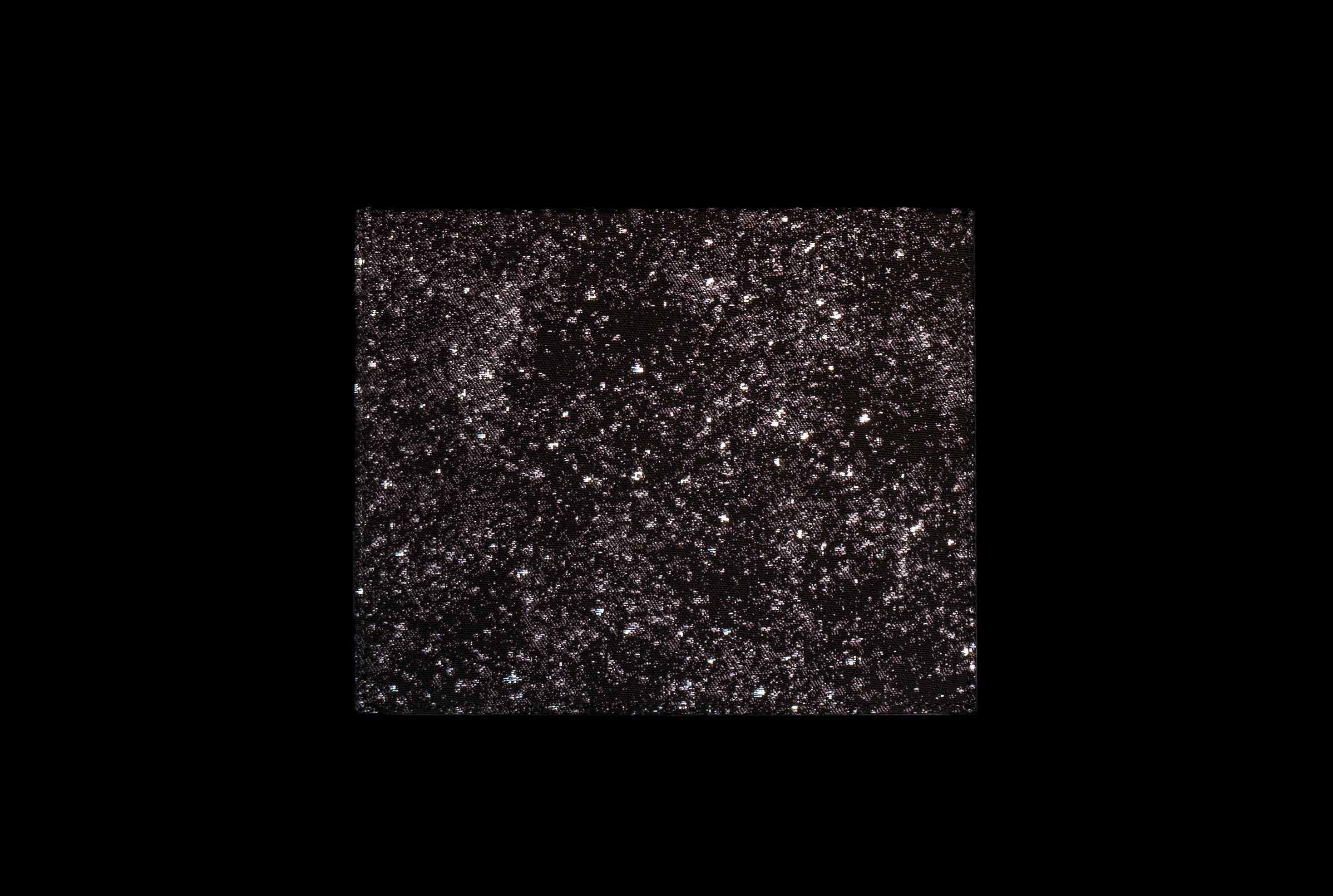 Box with golden textile