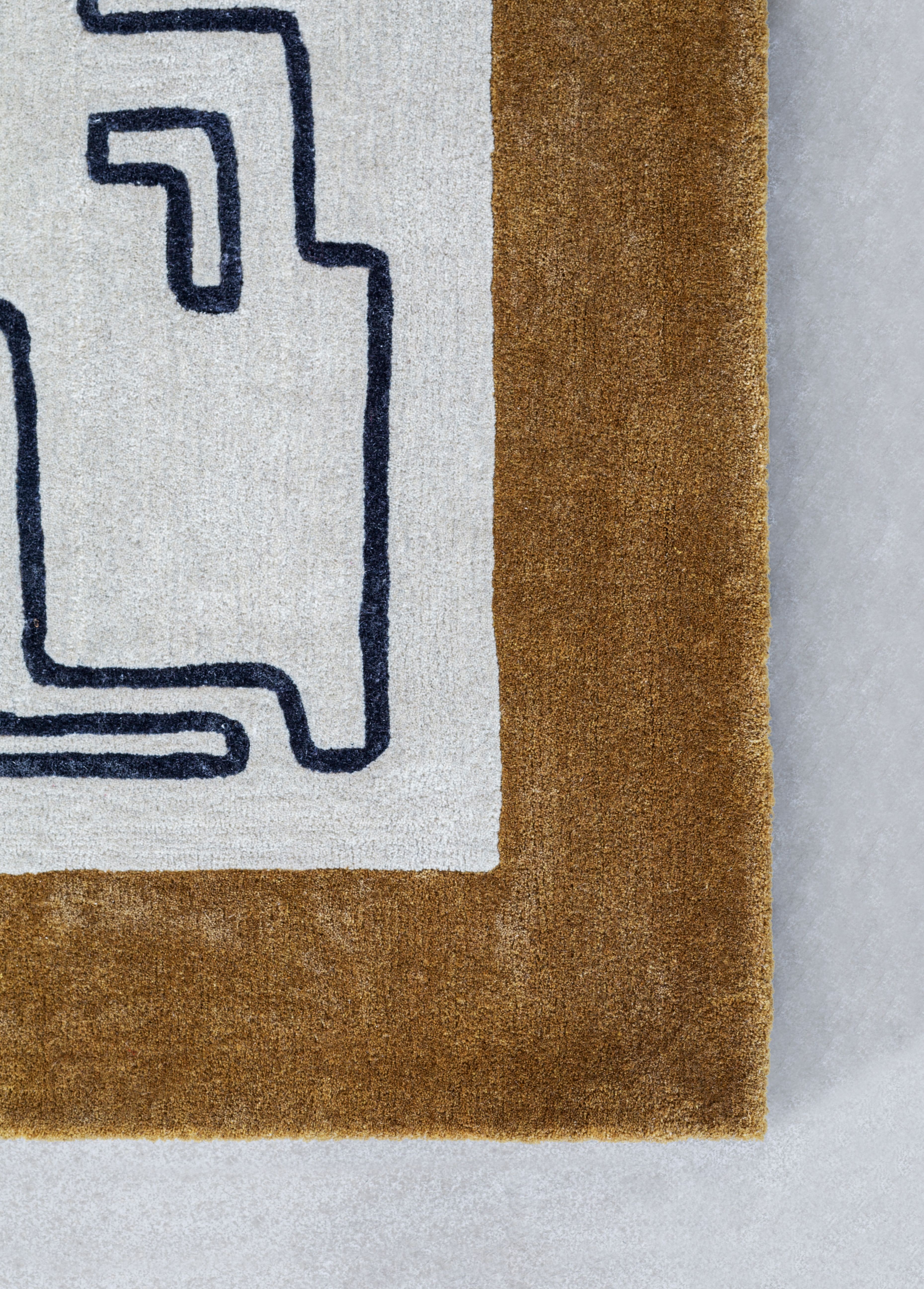 Rug in bamboo fibre and wool designed by OEO Studio for Massimo Cph