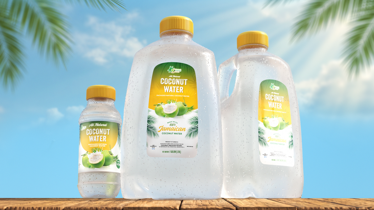 Coconut Industry Board coconut water bottles on wood surface, tropical backdrop