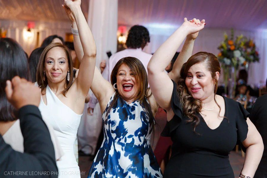 Embracing family on dance floor