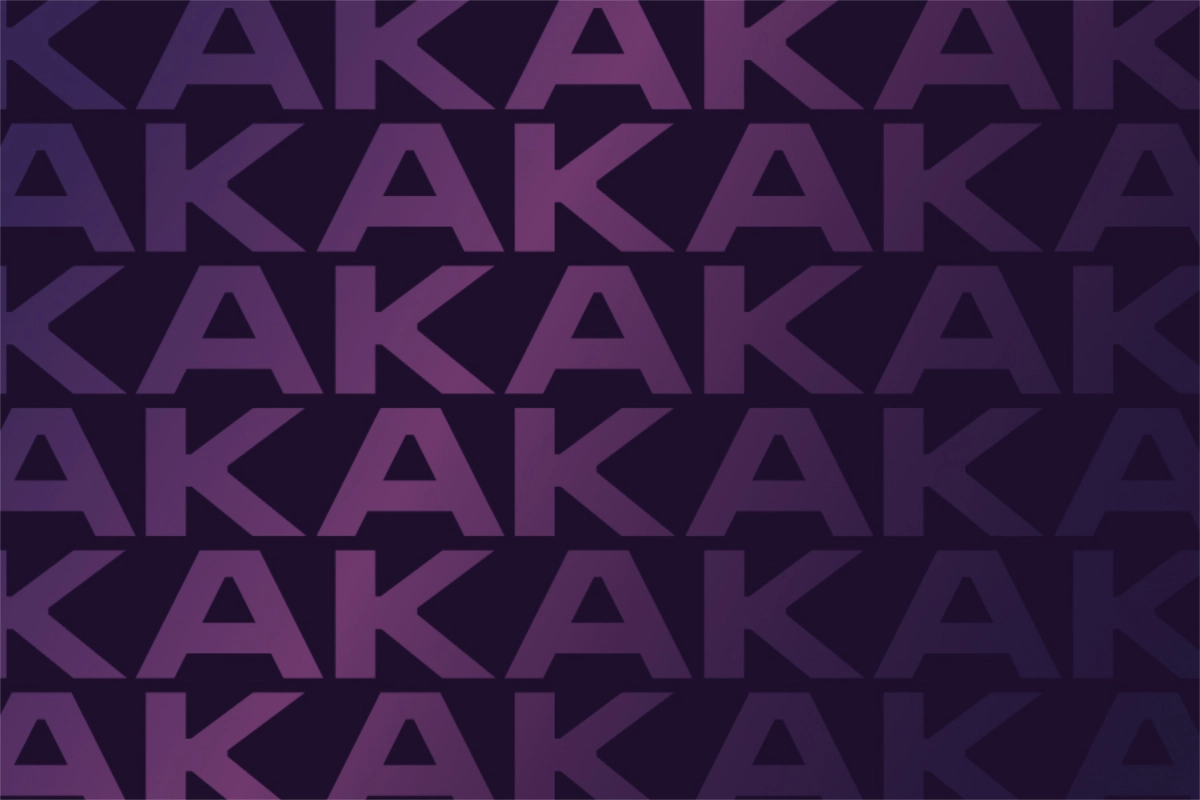 A repeating pattern of the Kane Andrews initials in purple tones