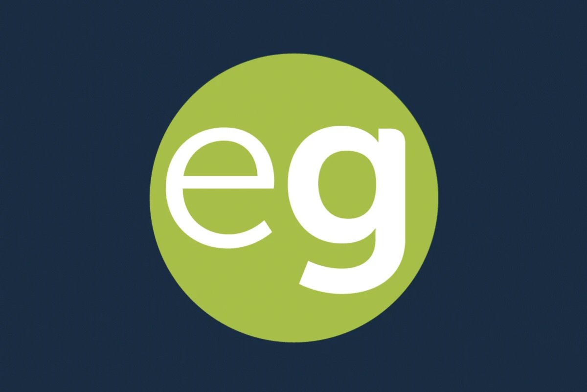 The Experience Guildford logo in white, green and dark blue.