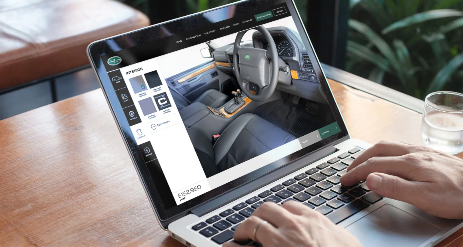 A laptop showing the Chieftain configurator interior customisation page, with leather and trim options and a price of £152,950