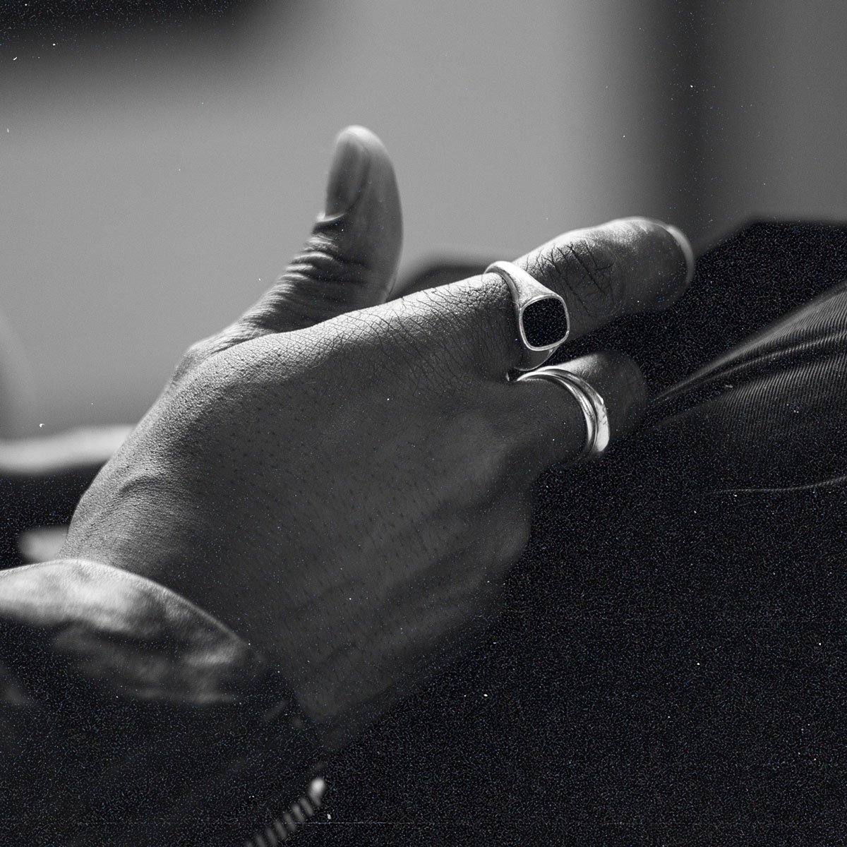 A hand with rings