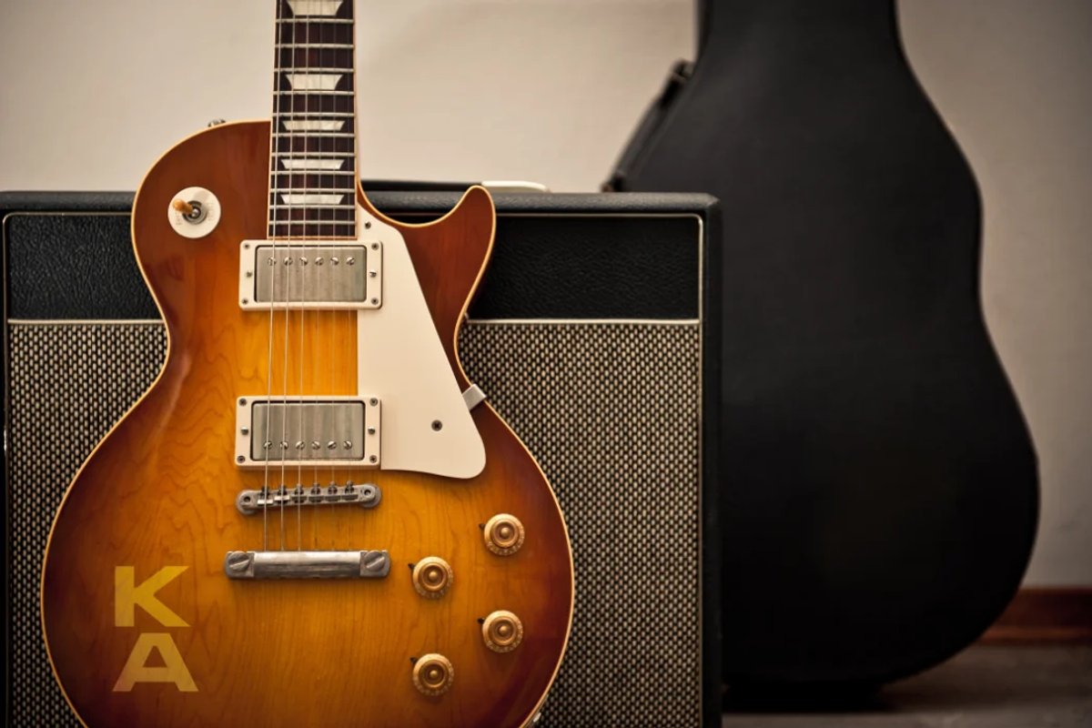 A Les Paul style guitar and amplifier