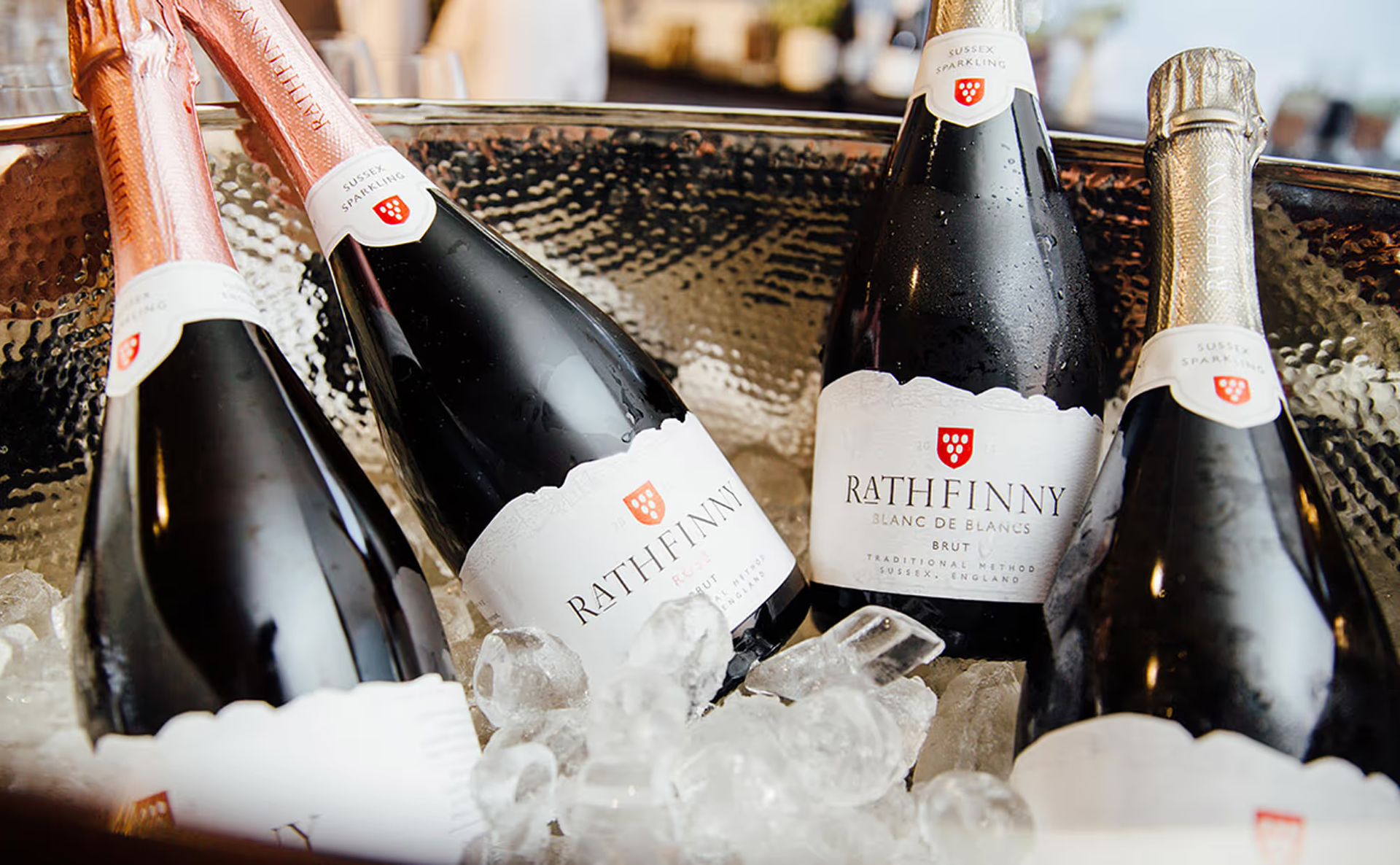 Rathfinny wine bottles in an ice bucket