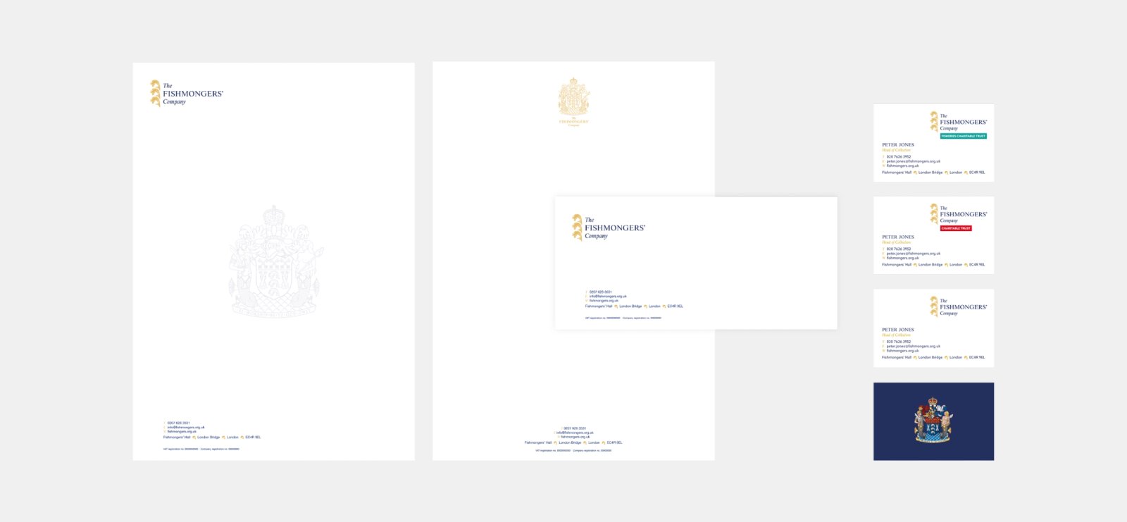 A stationery set for the Fishmongers' Company, including letterheads, a compliments slip and business cards with the gold crest and wordmark