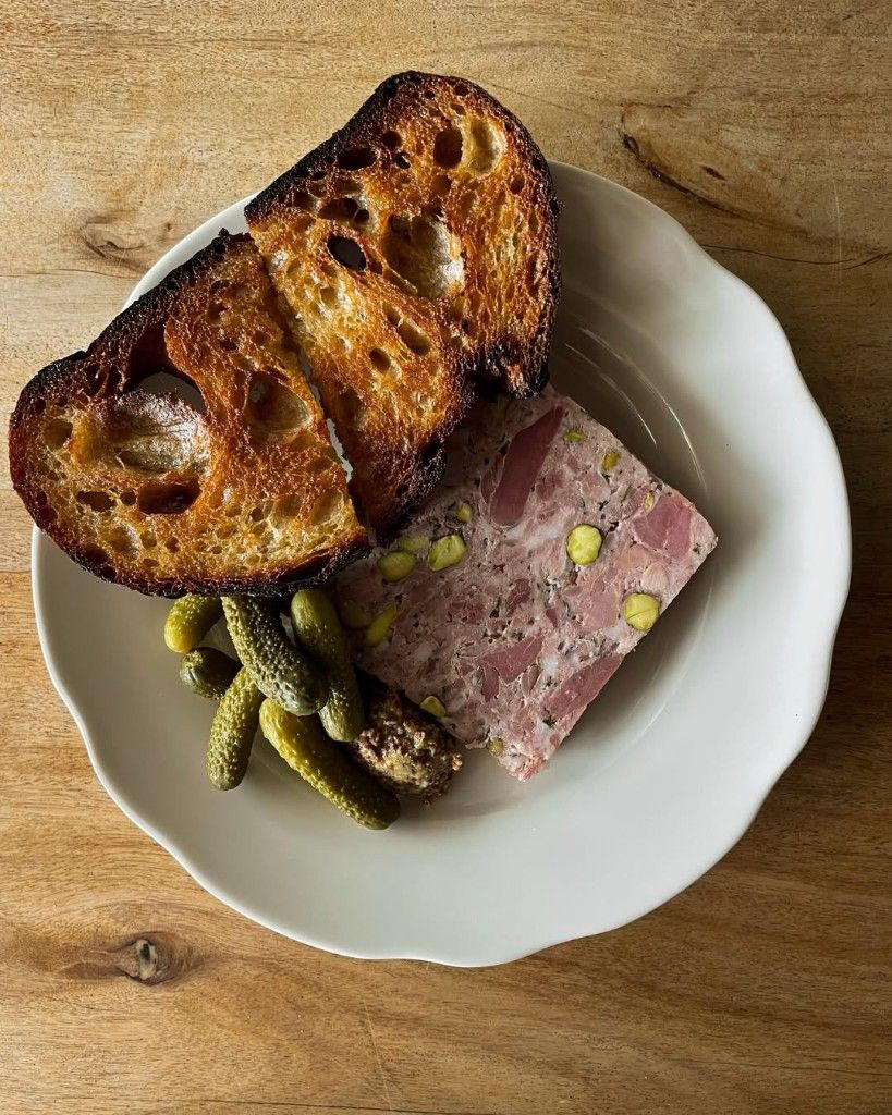 Pork and pistachio terrine with toasted sourdough and cornichons