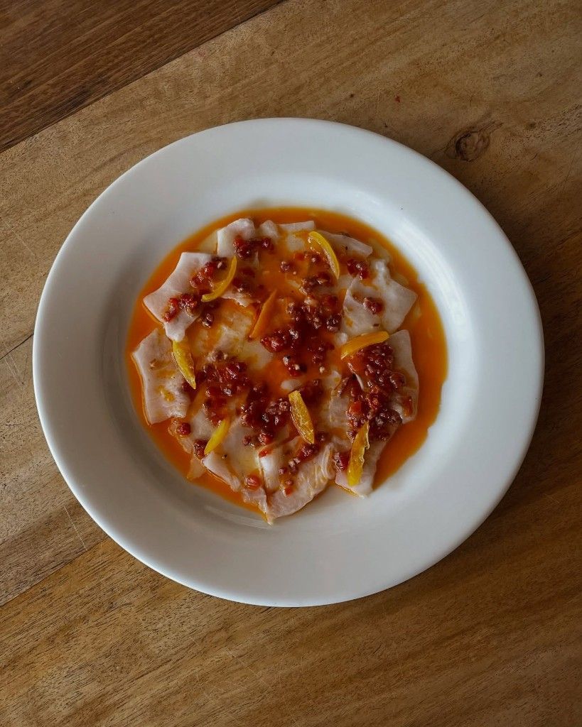Citrus-cured snapper with chilli oil and candied peel