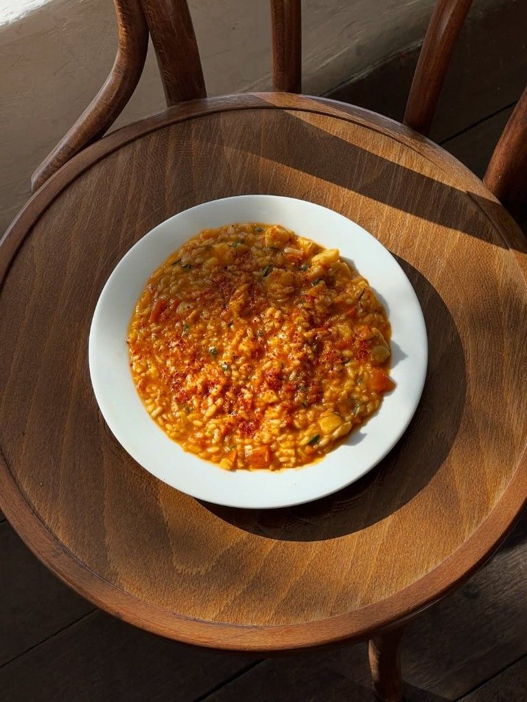 Saffron seafood risotto finished with smoked paprika