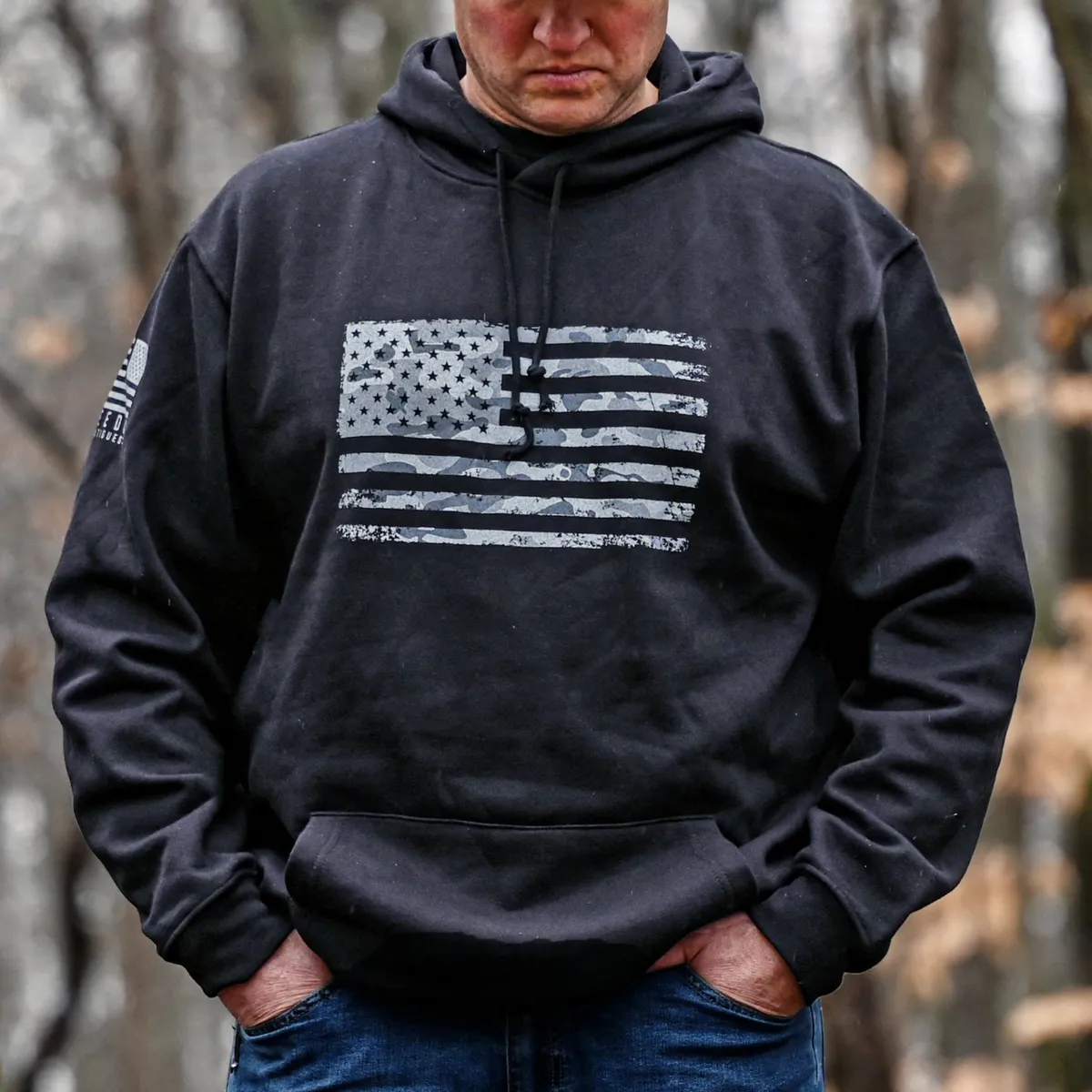 Secondary shot of Co-founder Chris wearing the Black Oversized Urban Camo Hoodie