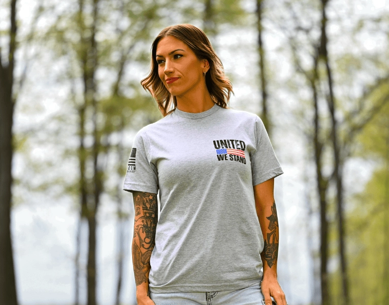 Female model wearing the United We Stand T-Shirt