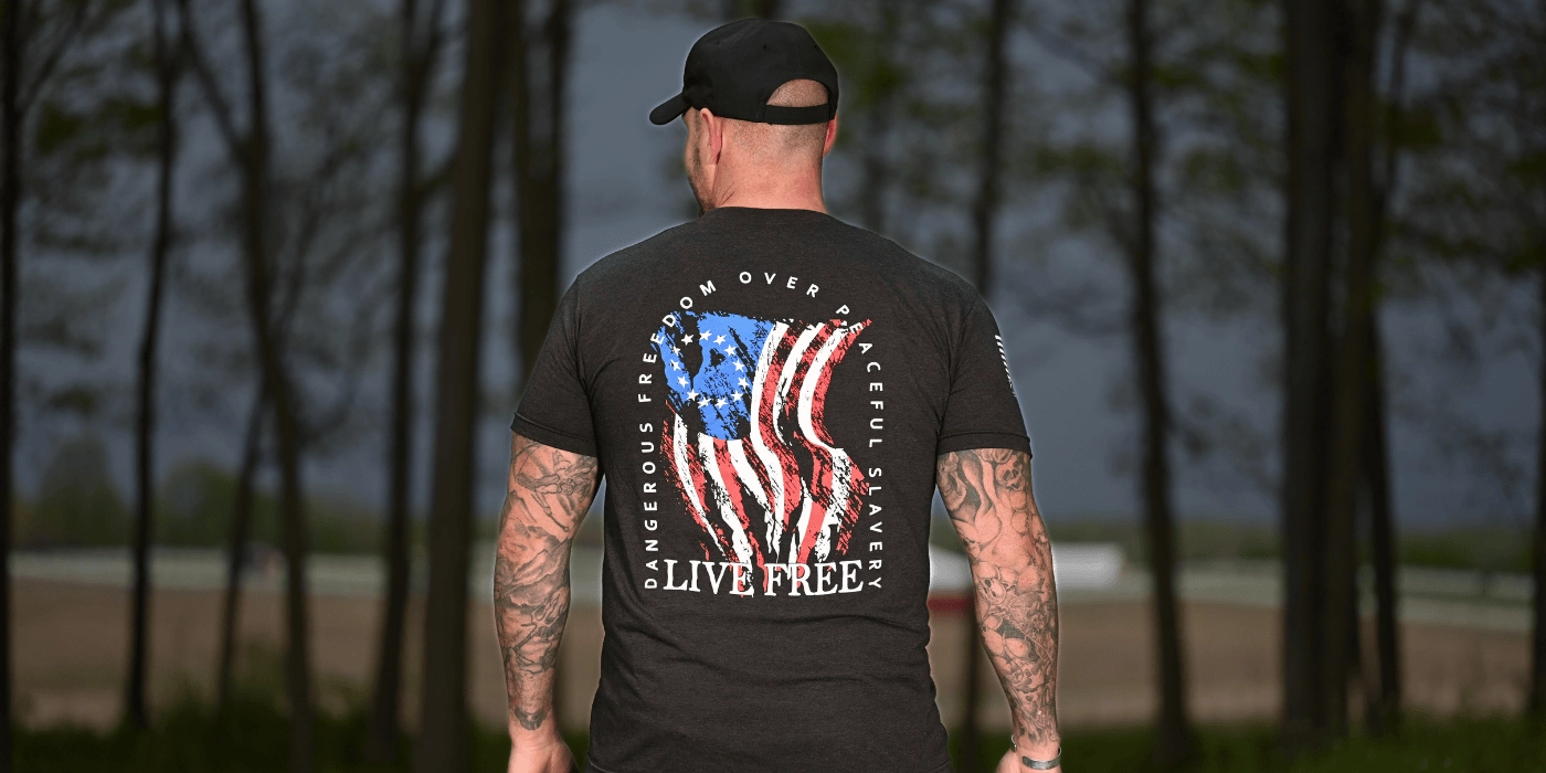 Mail model wearing the Live Free Shirt