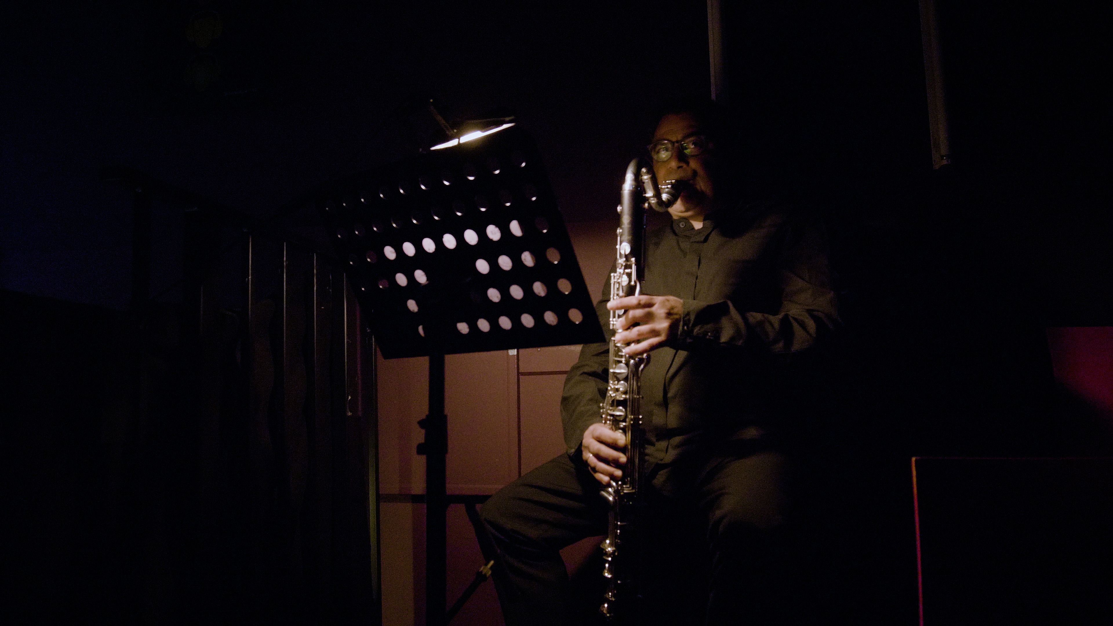 Sherif playing the Saxophone 