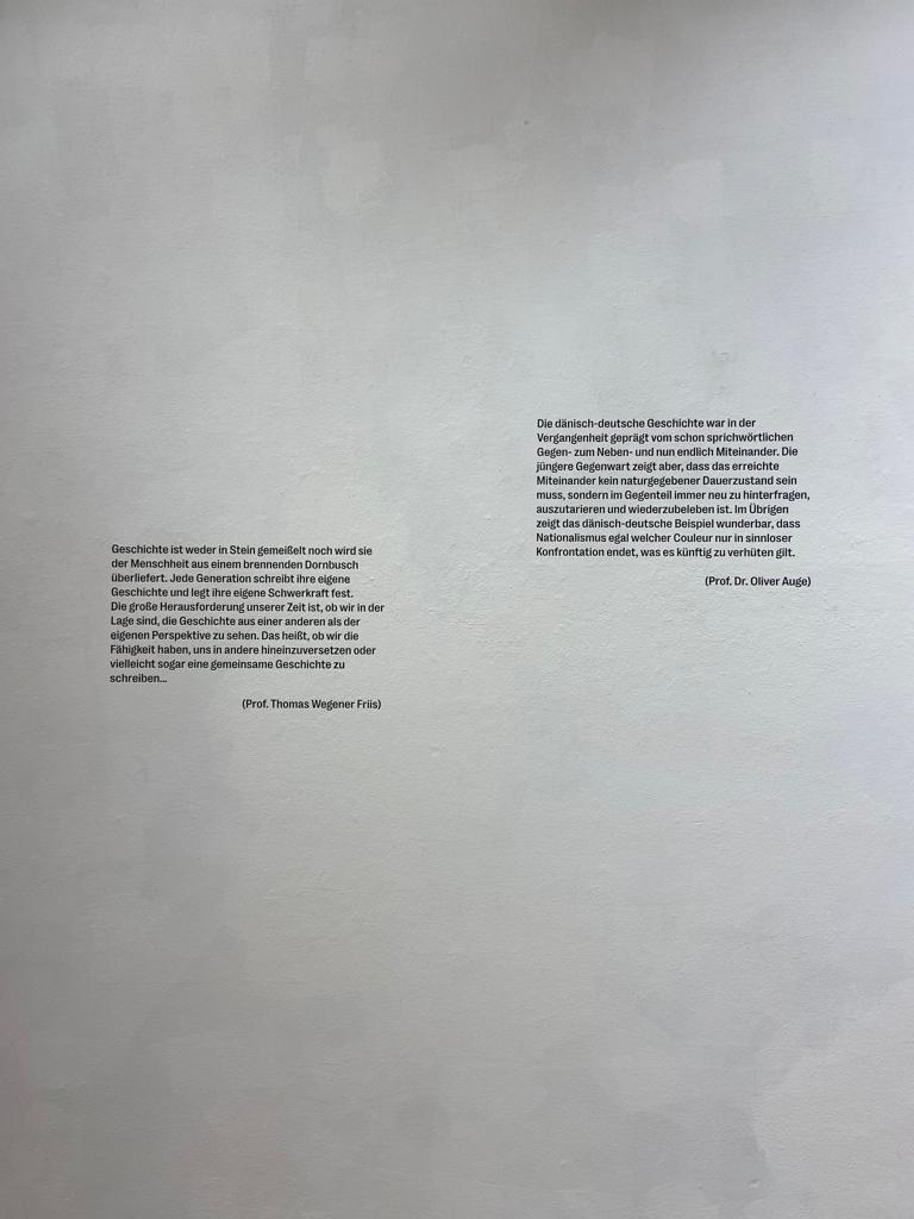 2 quotes on a wall