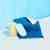 Cleaning Companions Pack: 1 Navy Cloud Cloth, 1 Scrub Sponge, 1 blue Pop-Up Sponge on white tile against blue background