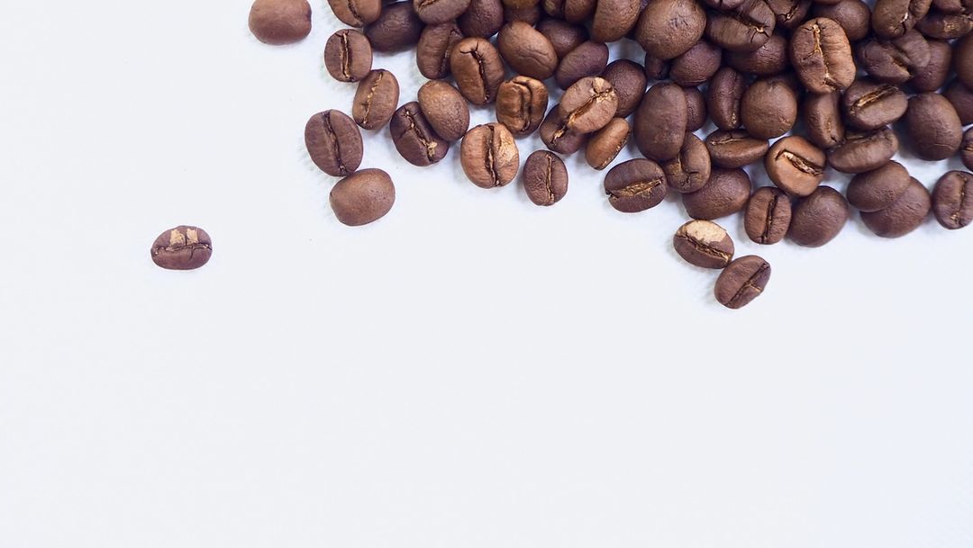 Blueland whole coffee beans on white background