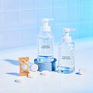 Blueland Hand Soap Duo against white and blue tile: 2 refillable glass  bottles, 6 Foaming Hand Soap Tablets