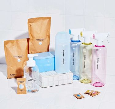 Everyday Clean on tile: 3 cleaning bottles + tablets,1 Hand Soap, dishwasher tablets and tin, Powder Dish Soap and shaker