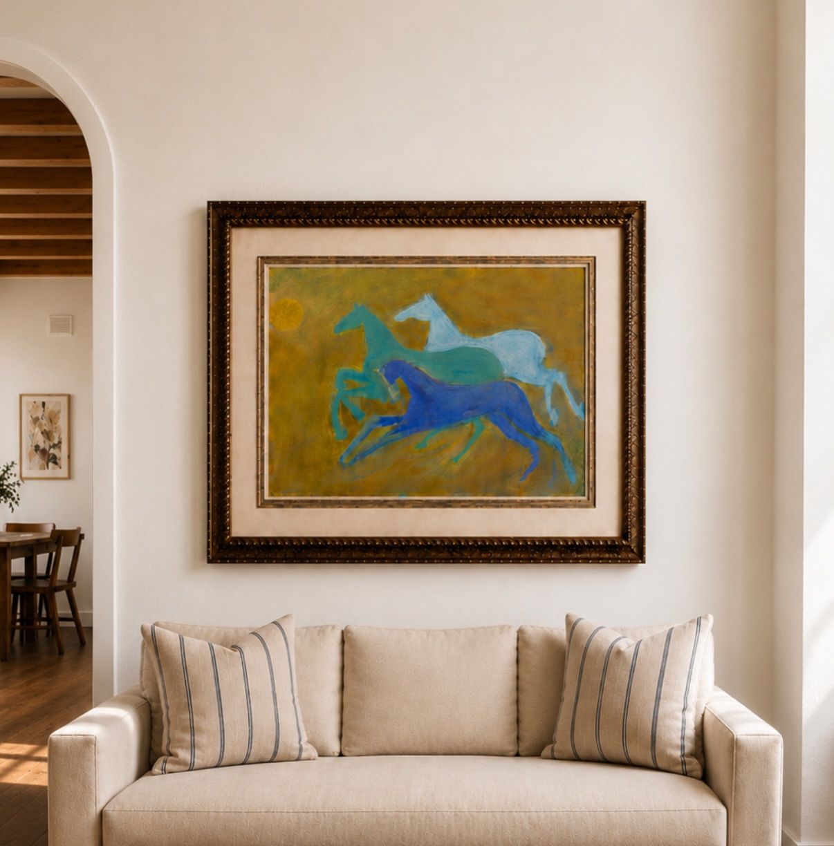 Race to the Sun hung above a cream sofa in a bright living room
