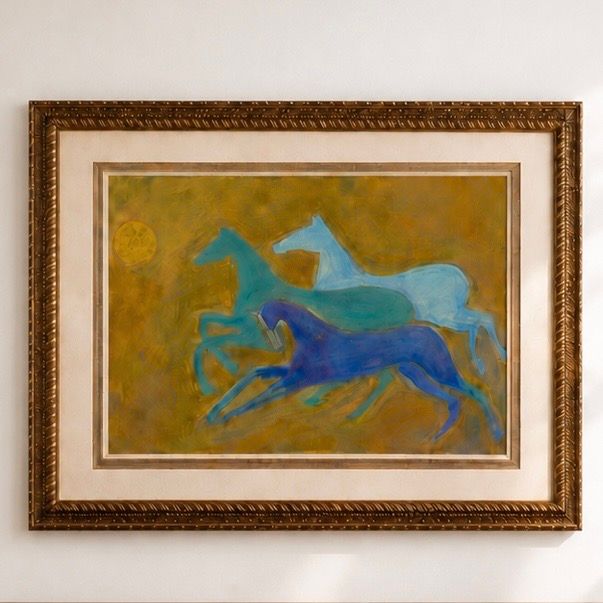 Race to the Sun — three horses in blues and teal galloping across a golden field beneath a yellow sun, in an ornate frame