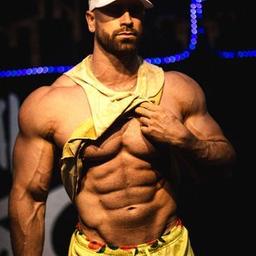 Bradley Martyn, US-based fitness creator with 4,016,967 Instagram followers, an 85.2% male audience, and five of his own businesses named in his bio