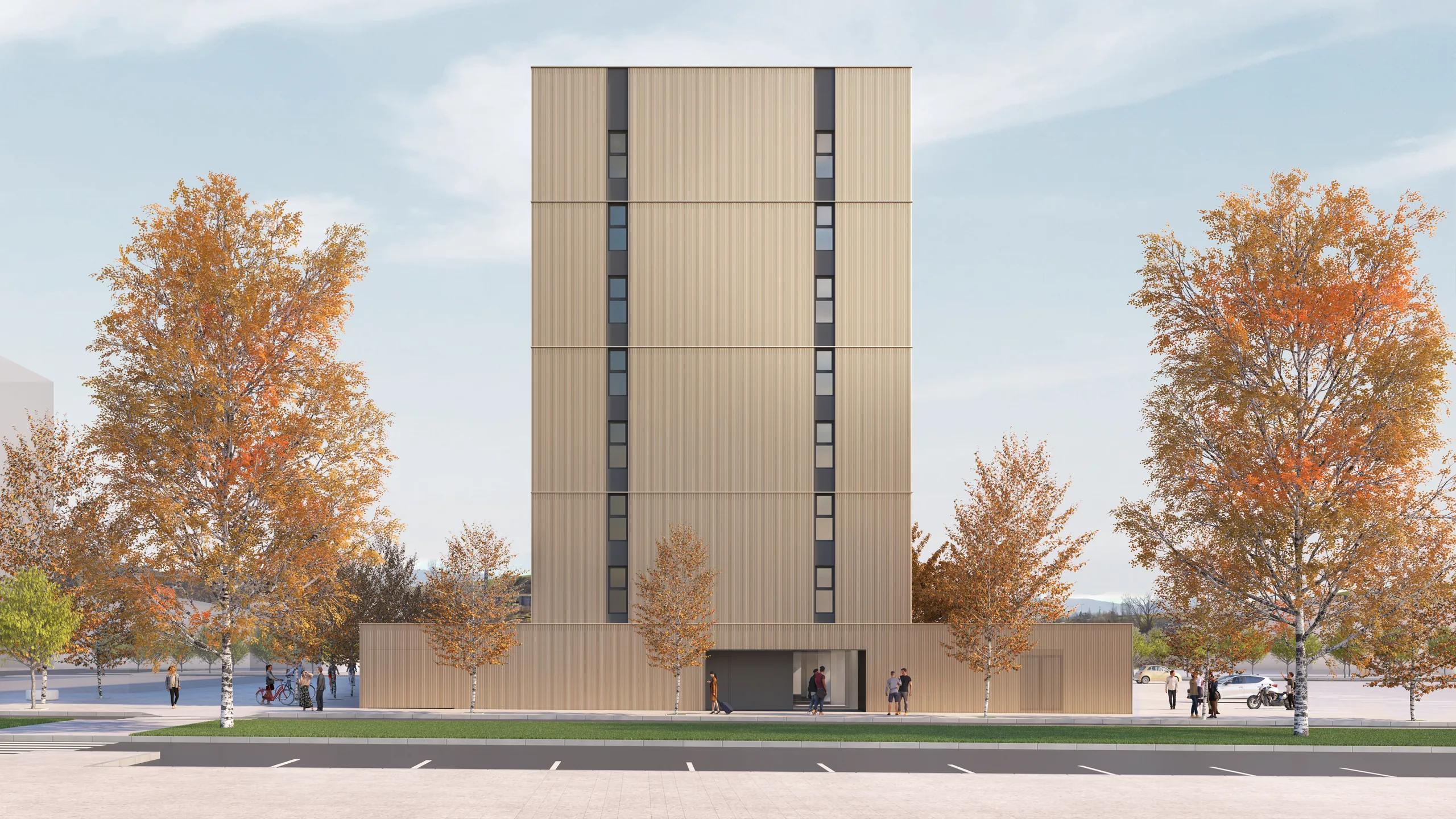 La torre, con fachada de paños claros y bandas verticales