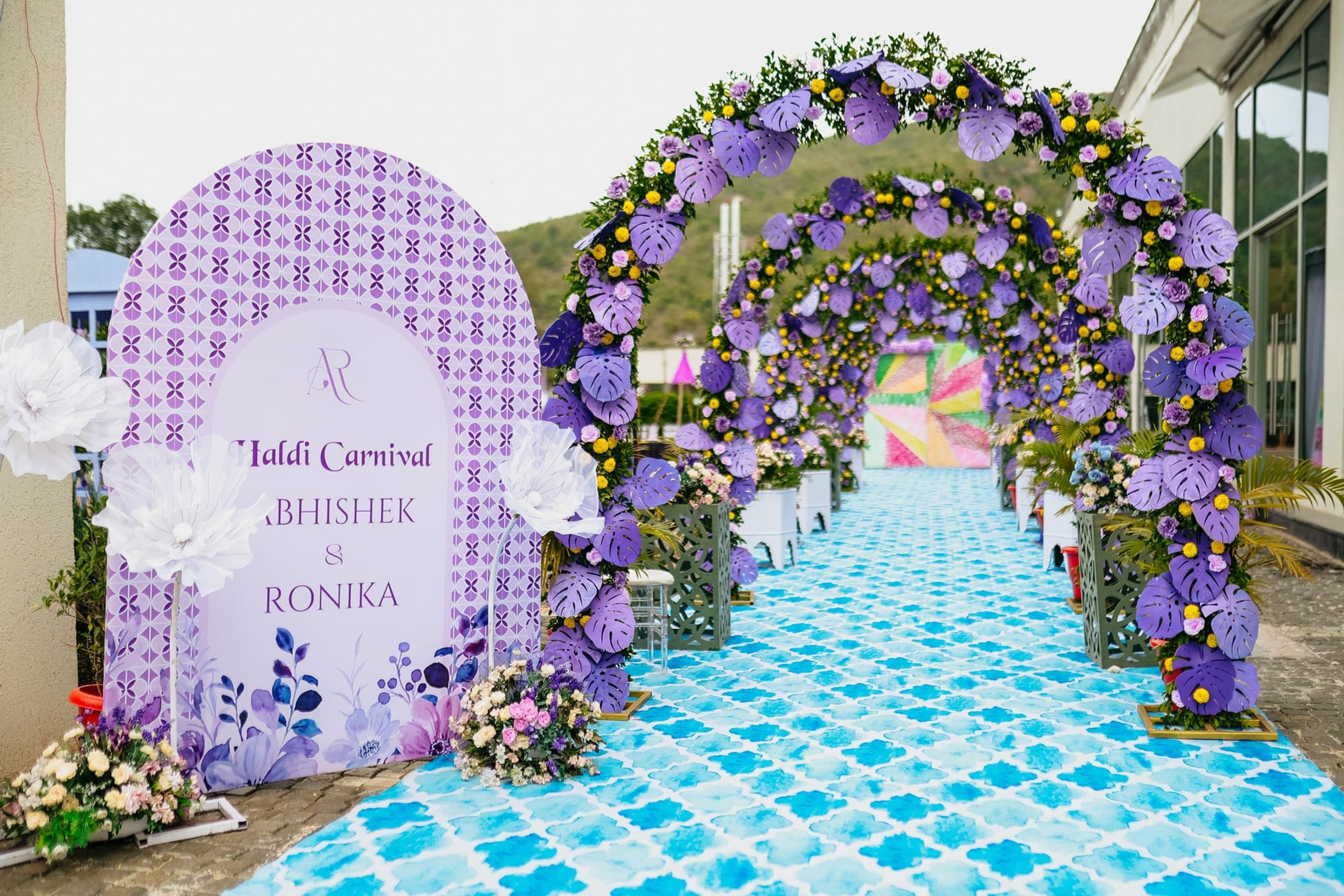Navy mandap stage with green florals