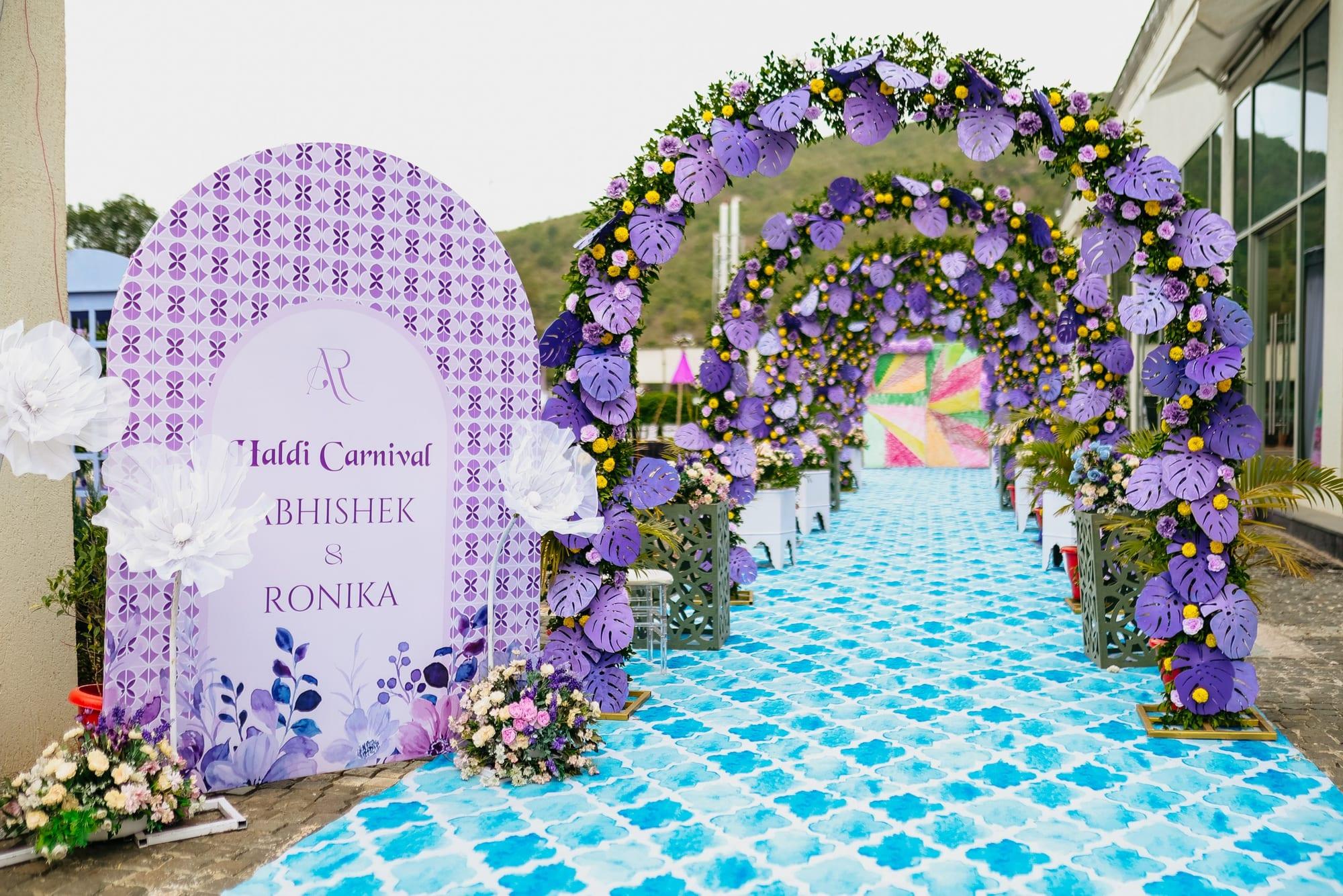 Navy mandap stage with green florals