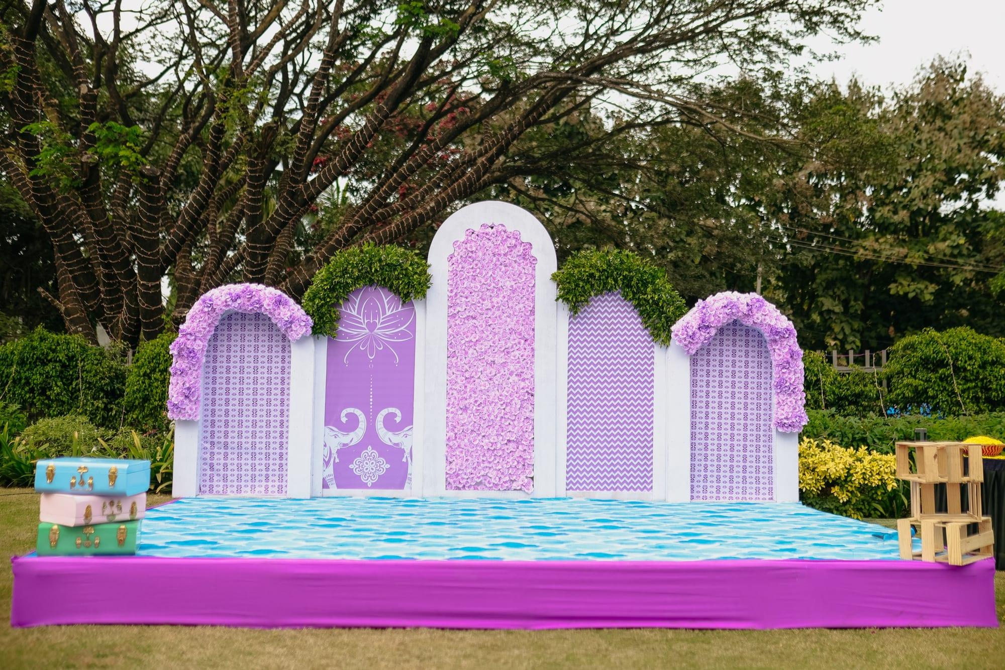 Lavender floral arch over the walkway