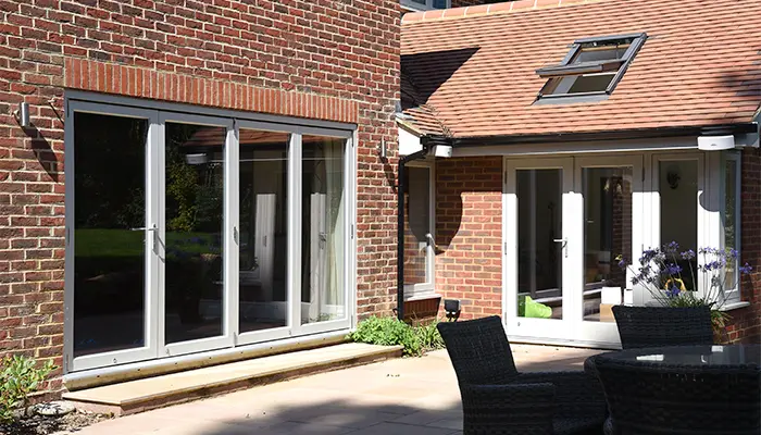 70s Home Reborn with Elegant Wooden Windows & Doors