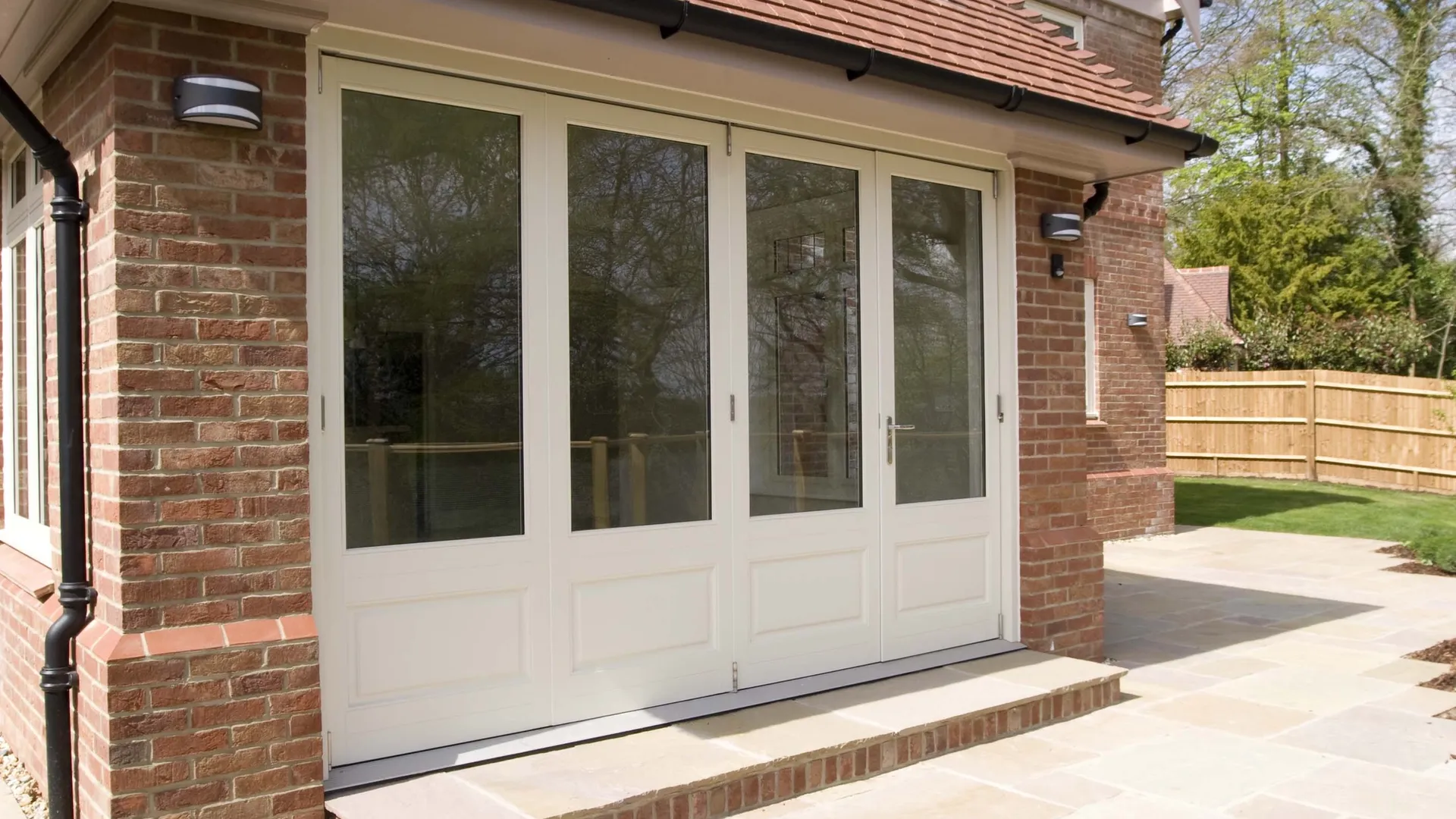 Bifold Door White Exterior - Bi-fold door in White